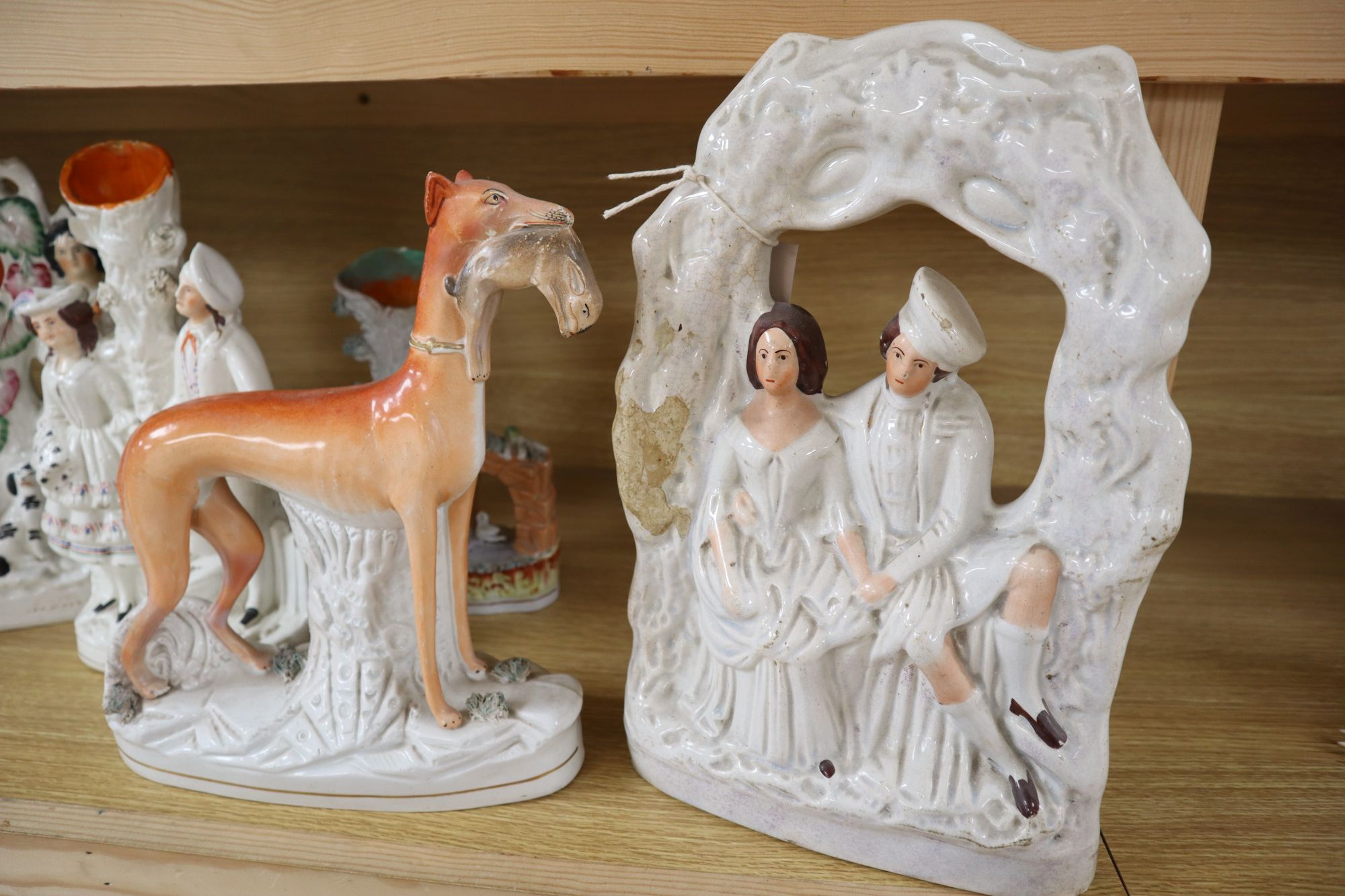 Seven Victorian Staffordshire flatbacks, tallest 33cm